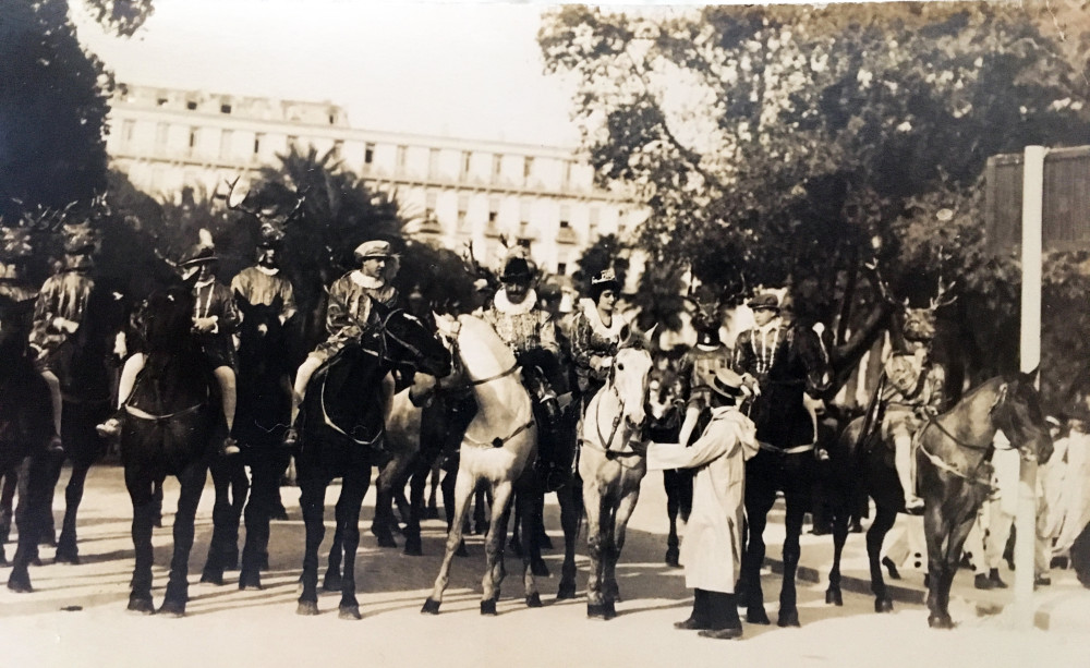 Men riding their horses at the nice carnival festival