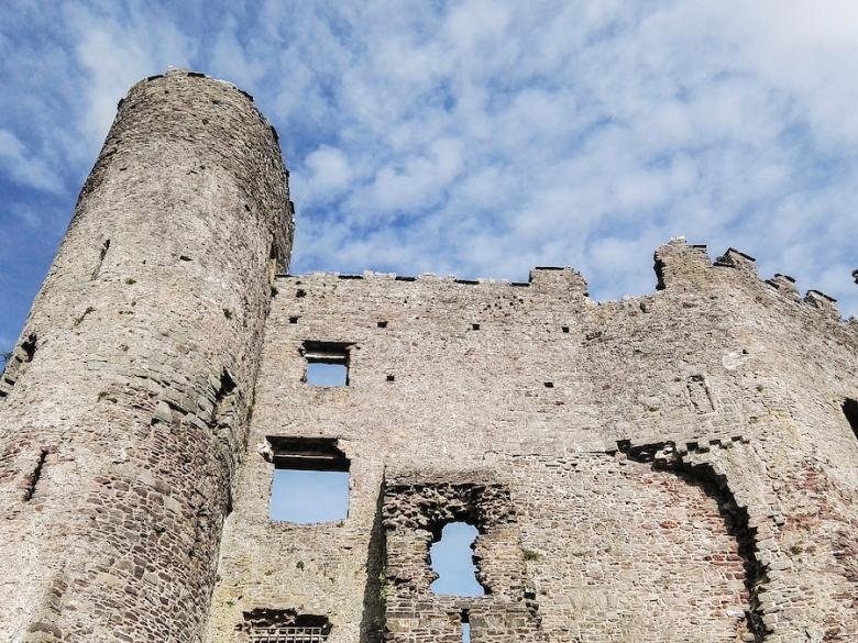 A lower view of Laugharne castle wales in the clear morning