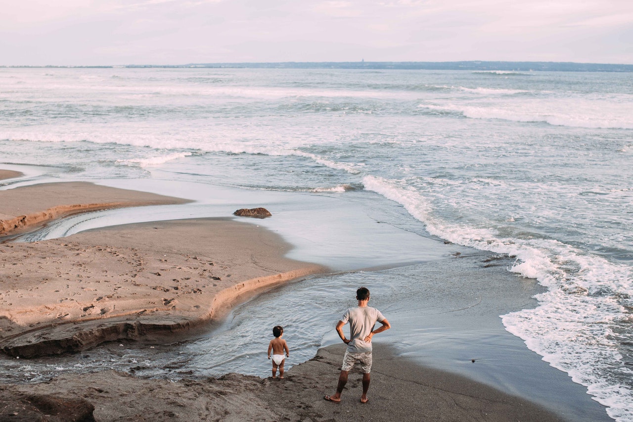 Man and Toddler Standing Near the Seashore Villa Eilenroc
