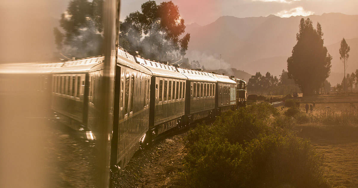 A View From A Train To Machu Picchu At Sunset