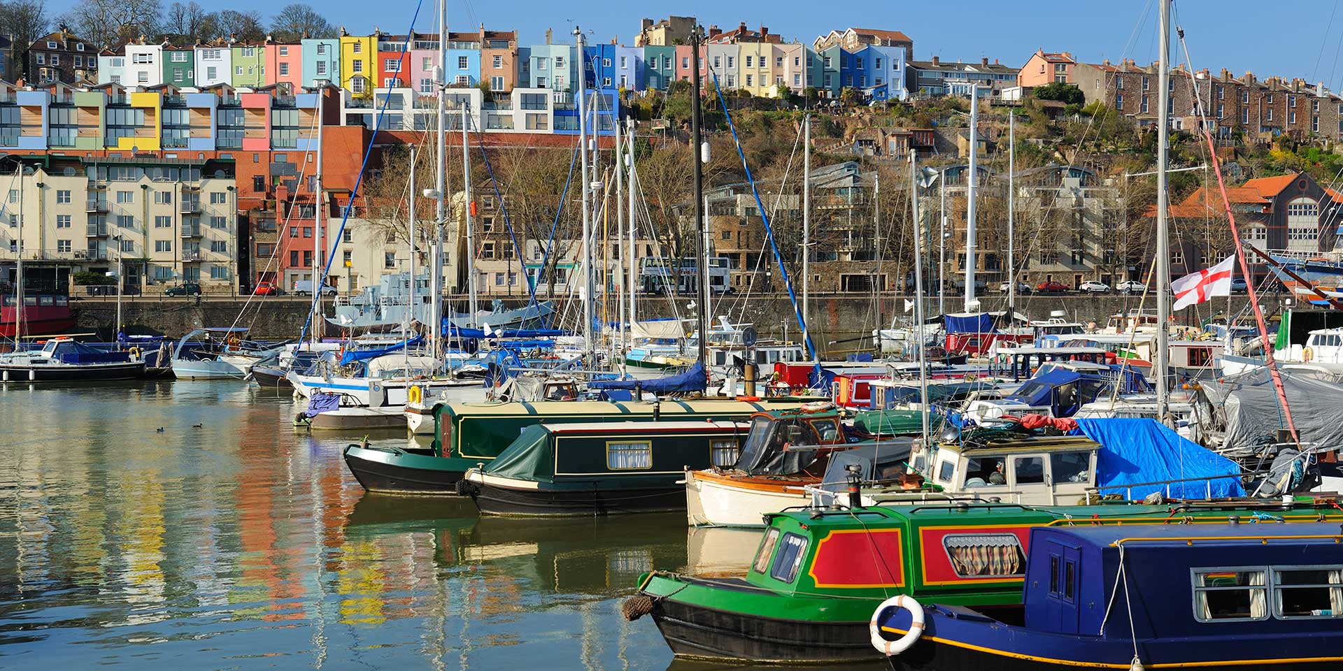 Bristol Harbor with its famous colorful buildings in the backdrop