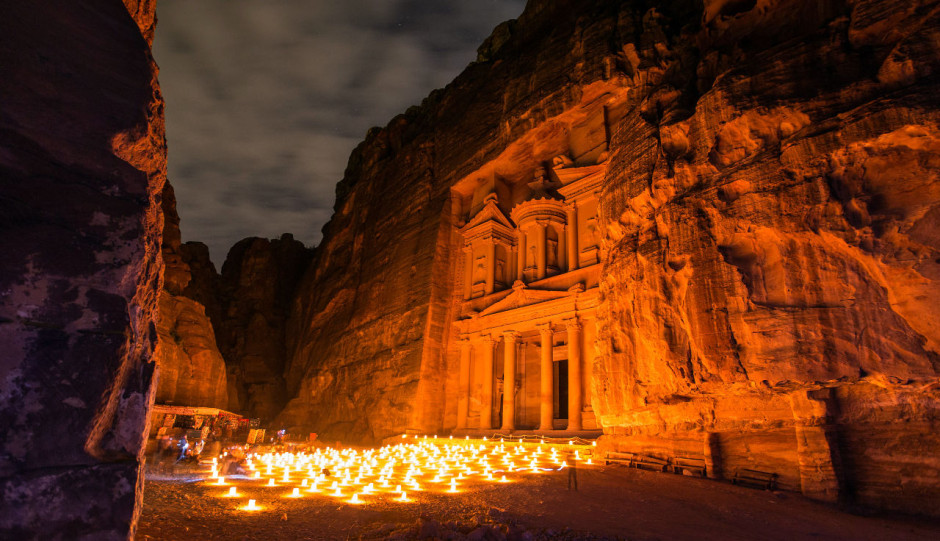 Petra by Night lit with many candles on the ground