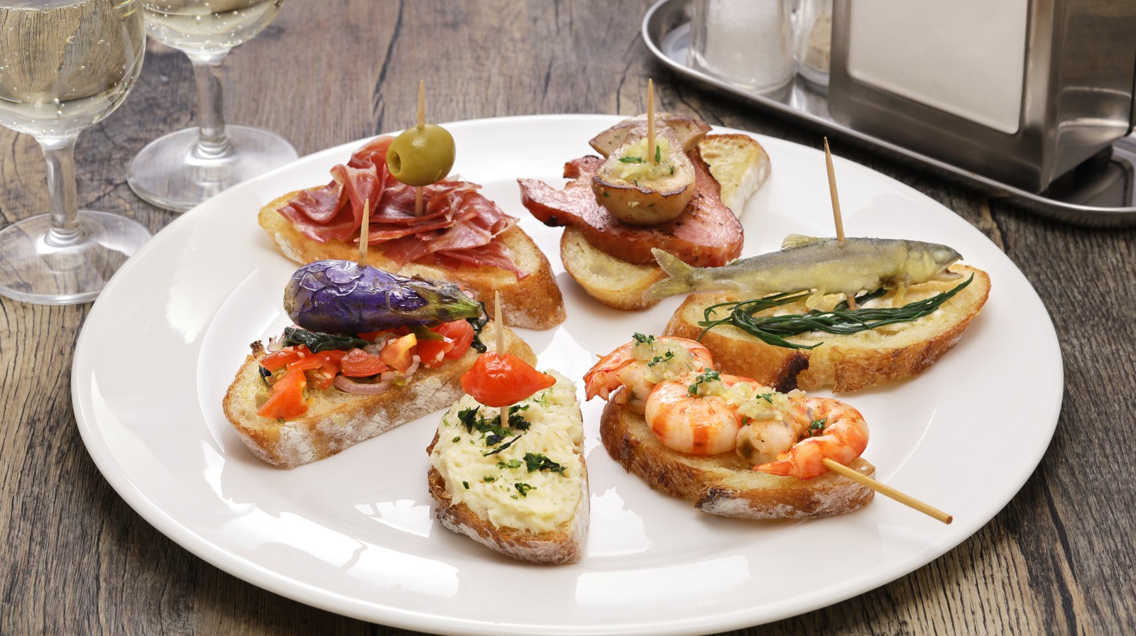 Cicchetti being served on a white plate