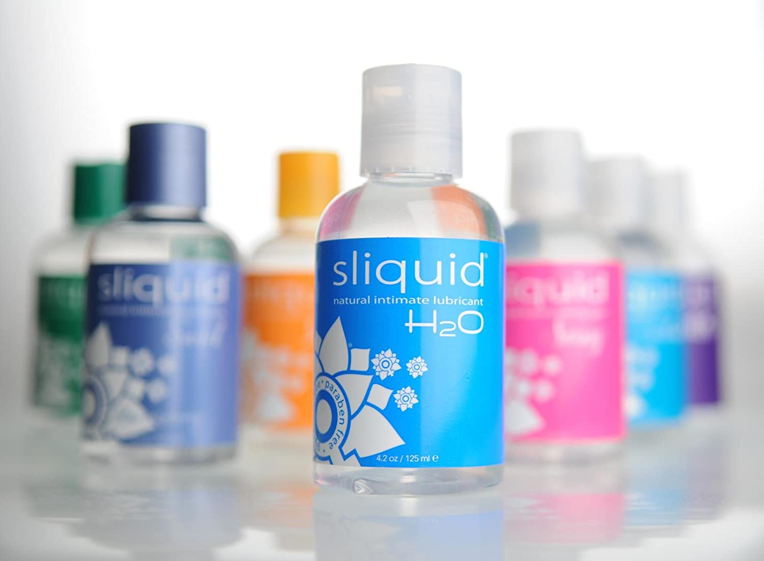Sliquid lubricants with different packaging colors 