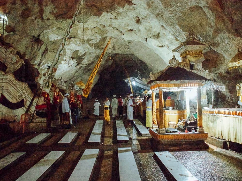 Tourists inside Giri Putri Cave Temple