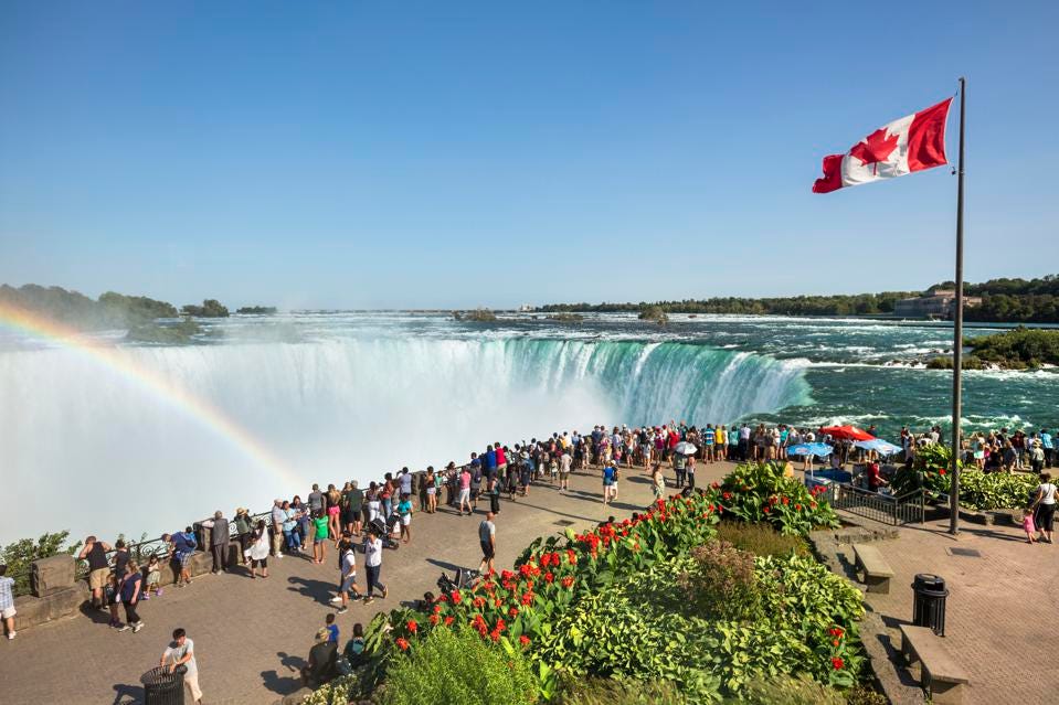 An aerial view of Niagara Falls with tourists