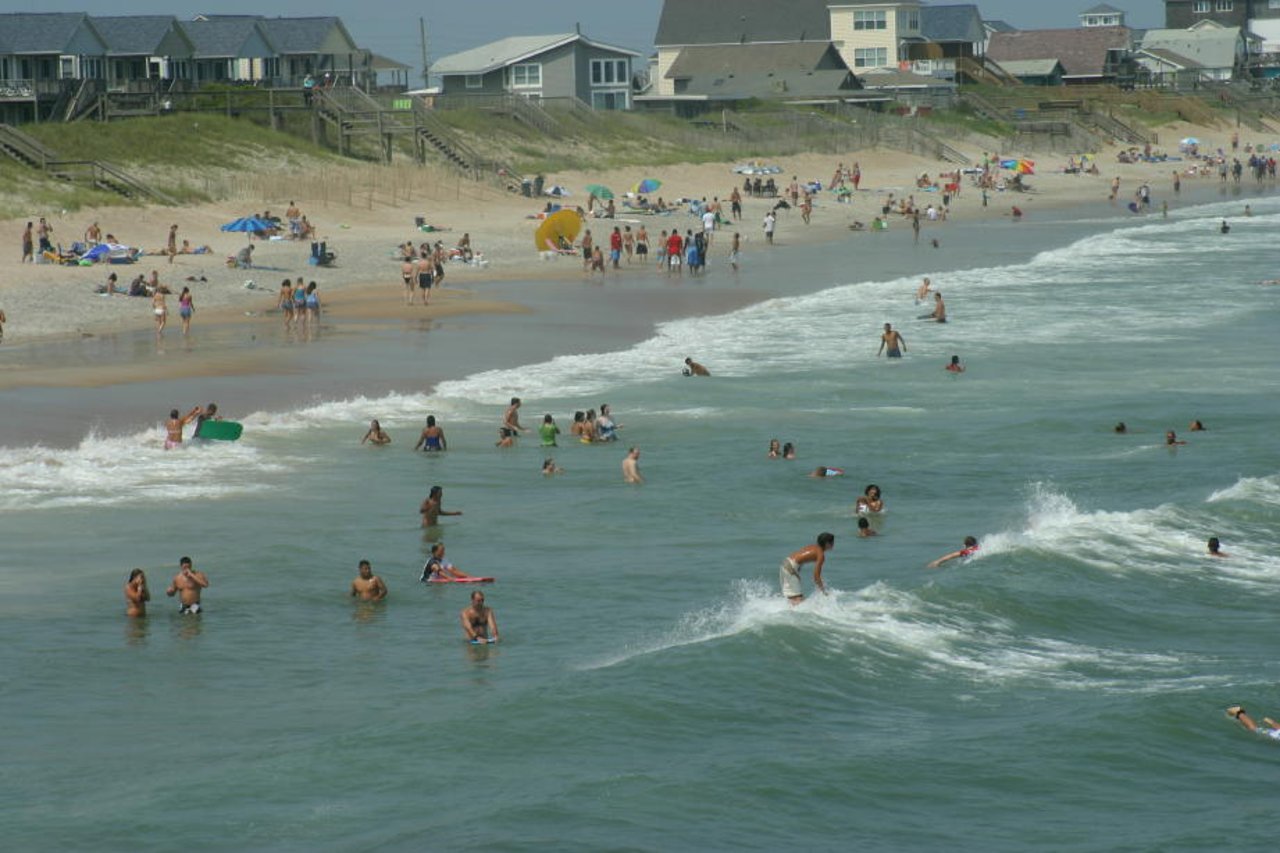 Tourists swimming at Topsail Beach