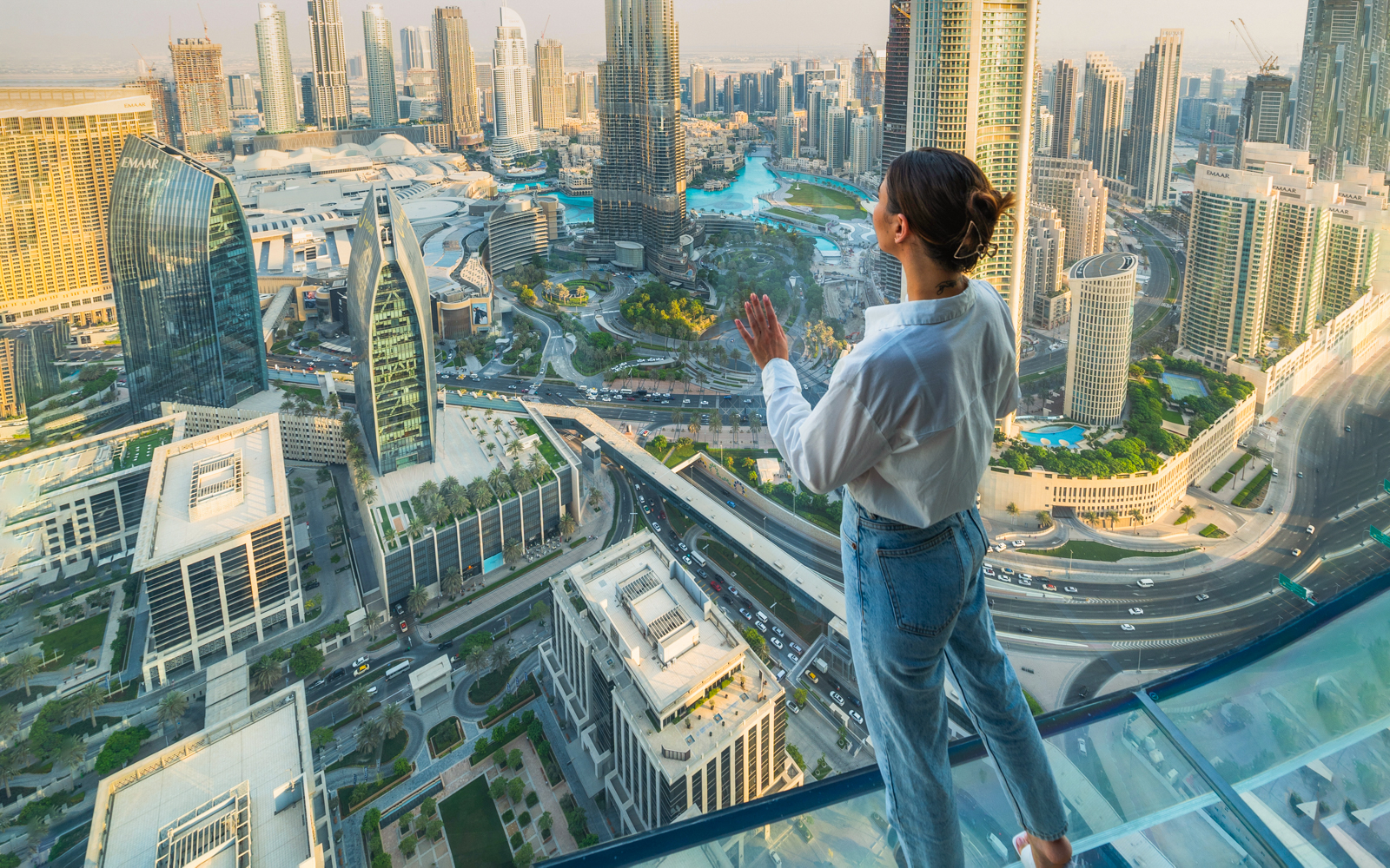 A woman standing at Sky Views Dubai